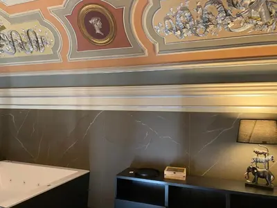Letto o letti in una camera di Duomo Housing Catania Le Suites