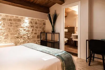 Letto o letti in una camera di Dimora Bennardo