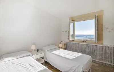 Letto o letti in una camera di Beautiful Home In Siracusa With Wifi