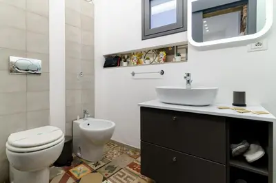 Bagno di Antico Basolato House