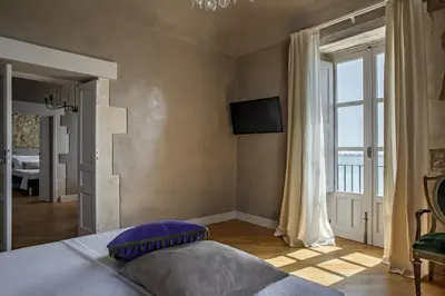 Letto o letti in una camera di Dimora Aretusa Luxury
