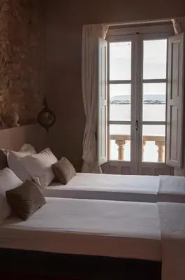 Letto o letti in una camera di Dimora Aretusa Luxury