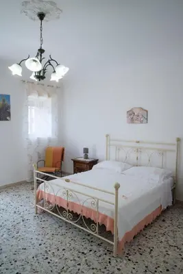 Letto o letti in una camera di La casetta di Anna