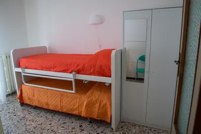 Letto o letti in una camera di La casetta di Anna