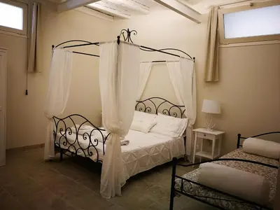 Letto o letti in una camera di Stomachion