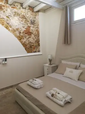 Letto o letti in una camera di Stomachion