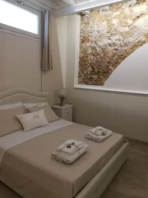 Letto o letti in una camera di Stomachion