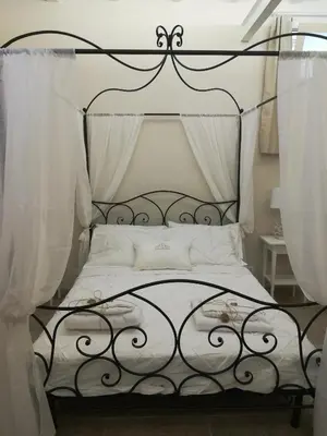 Letto o letti in una camera di Stomachion