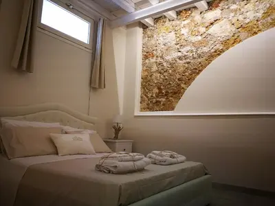Letto o letti in una camera di Stomachion