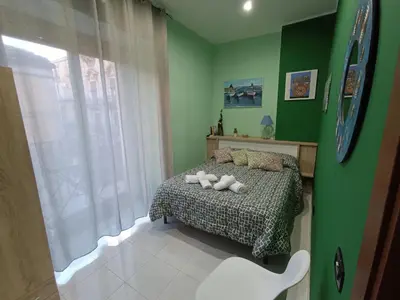 Letto o letti in una camera di Casa Emanuele