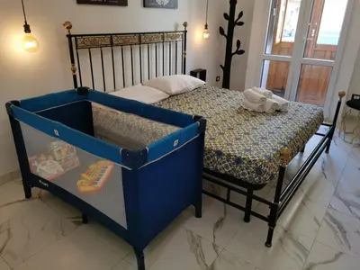 Letto o letti in una camera di Casa Annita, casa vacanza in stile Sicilia, in pieno centro a Pachino