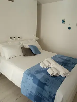 Letto o letti in una camera di DAMASTE' Pachino