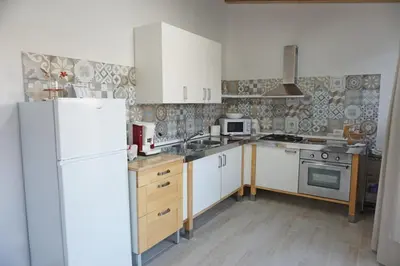 Cucina o angolo cottura di Holiday House Villa AleGiù Marzamemi