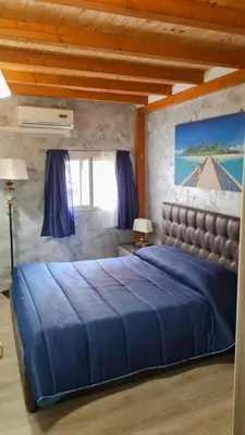 Letto o letti in una camera di Trinacria