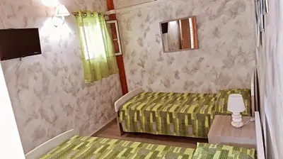 Letto o letti in una camera di Trinacria