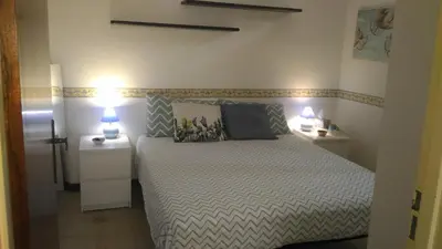 Letto o letti in una camera di Villino Oleandro