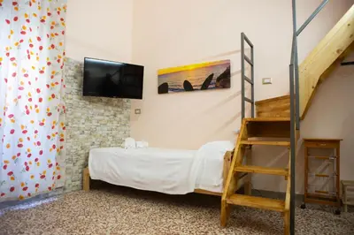Letto o letti in una camera di I VACANZIERI