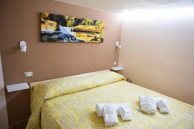 Letto o letti in una camera di I VACANZIERI