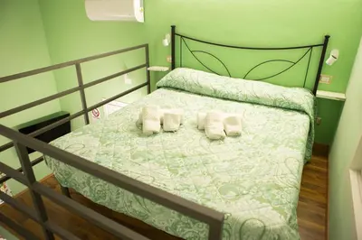 Letto o letti in una camera di I VACANZIERI