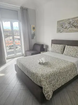 Letto o letti in una camera di Desy's house - Apartments with Arch View, Catania Historic Center