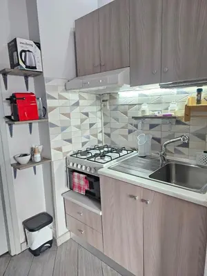Cucina o angolo cottura di Desy's house - Apartments with Arch View, Catania Historic Center