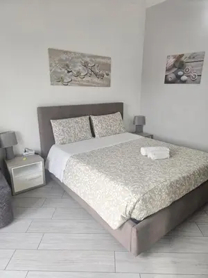 Letto o letti in una camera di Desy's house - Apartments with Arch View, Catania Historic Center