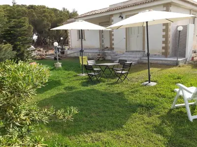 Giardino di Bilocale climatizzato - Wi-fi in villa in pieno relax