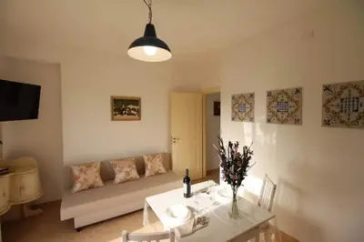 Area soggiorno di Bilocale climatizzato - Wi-fi in villa in pieno relax