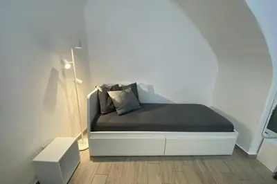 Letto o letti in una camera di Catania Dammuso house