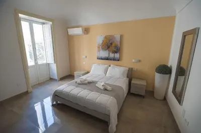 Letto o letti in una camera di Panorama Alfeo