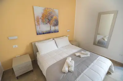 Letto o letti in una camera di Panorama Alfeo