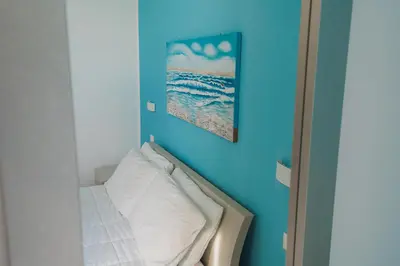 Letto o letti in una camera di Panorama Alfeo