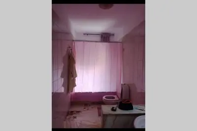 Letto o letti in una camera di Casa Helios con ascensore