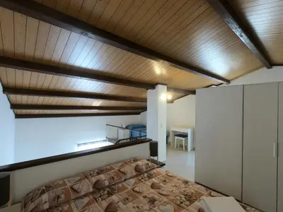 Letto o letti in una camera di Casa Nicea