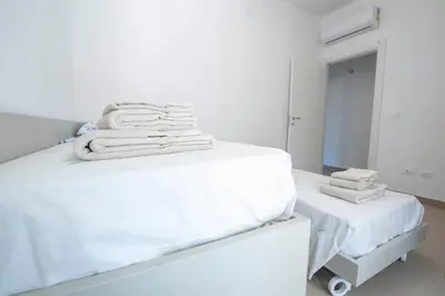 Letto o letti in una camera di Villa Orietta