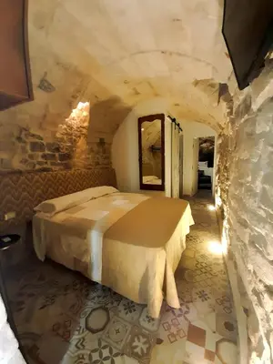 Letto o letti in una camera di CA SIEMU