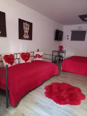 Letto o letti in una camera di suite Holiday House Bonaccorso