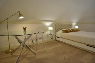 Letto o letti in una camera di Home dentro il teatro