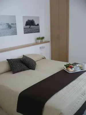 Letto o letti in una camera di Le Stanze Del Sole