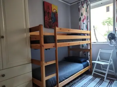 Letto o letti a castello in una camera di Iris house