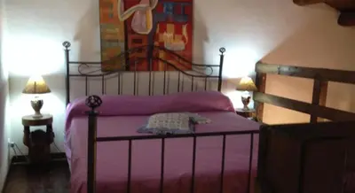 Letto o letti in una camera di Agriturismo Vita e Natura
