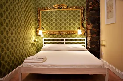 Letto o letti in una camera di Casa Nirè II