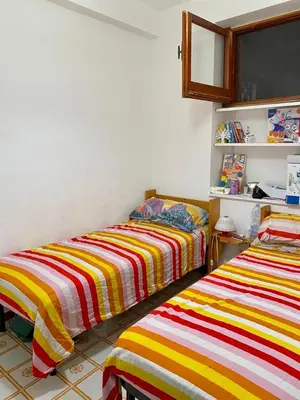Letto o letti in una camera di Casa Mare Costa Saracena - Castelluccio
