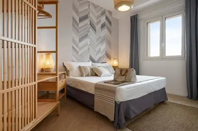 Letto o letti in una camera di Villa Gemma mare e piscina riscaldata
