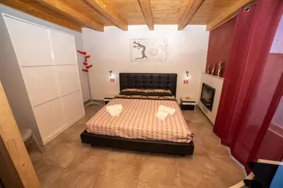Letto o letti in una camera di la casa di miky