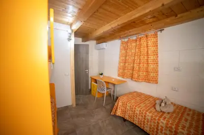 Letto o letti in una camera di la casa di miky