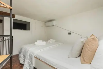 Letto o letti in una camera di Gesuiti Home - Lumina Collection