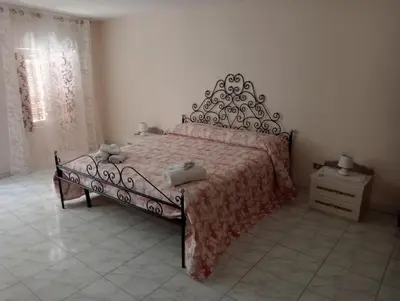 Letto o letti in una camera di Casa Agatina