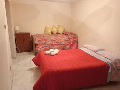 Letto o letti in una camera di Casa Agatina