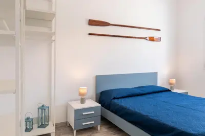 Letto o letti in una camera di Margló